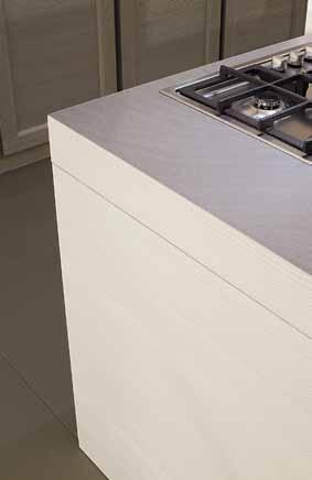 > ISLAND COMPOSITION WITH DOORS BIANCO FINISHED, TALL UNITS SIDE AND WALL PANELING ARGILLA FINISHED, DOORS OPENING WITH VENEERED GROOVE, 10 CM THICK WORKTOP IN STONE LAMINATE