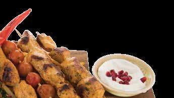 Unsere Grill Specials Serviert wahlweise mit Basmati Reis oder Pommes Frites Shawarma Platte (C, L, M, N) 9,90 Shawarma Hühnerfleisch vom Spieß, serviert mit