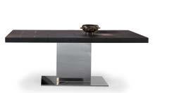 the imposing trapezoidal stainless steel, veneered wood or lacquered leg is glued to the glass top with steel plates.