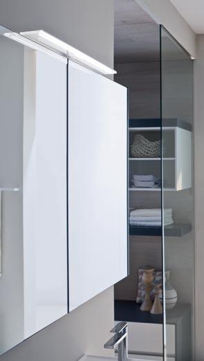 > expression of a clear living STanDarD. The wall cabinet is a clever Space-Saving STorage SoluTion.