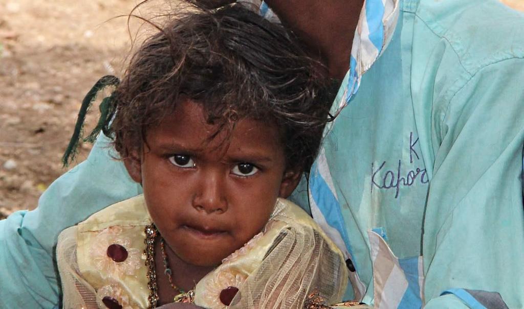 Geschichte aus Indien Ich werde diesen Gesichtsausdruck nicht mehr vergessen. Mit seinen dunklen Augen schaute mich das kleine Mädchen an.