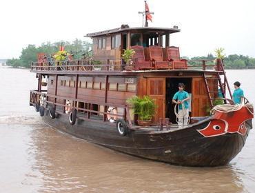 5. Tag: Flusskreuzfahrt auf dem Mekong / nach Saigon Sie erwachen zu den morgendlichen Geräuschen am Fluss. Nach dem Frühstück Cruise durch die Kanäle und Besuch eines Dorfes am Ufer.