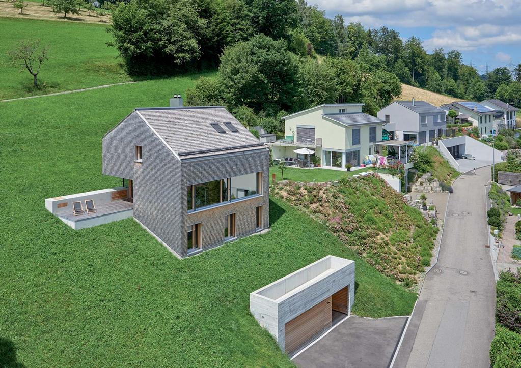 Haus 3B Um die herrliche Aussicht in das kleine Tal im Kanton Aargau auszunützen, sitzt das Haus weit