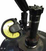 Set dial gauge onto the concentricity control zone of the tool. Use a 0,001 (1ym) dial gauge. 4.