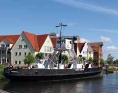 Während des Mittagsessens an Board, fährt das Schiff weiter nach Greifswald-Wieck.