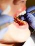 Auswirkungen von Wasser-Pulverstrahlgeräten auf Zahnhartgewebe und Restaurationsmaterialien