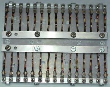 shaker hot crimped Litz wire ends clamping plate Fig. 117. Clamping plate for vibration test samples, results after the test.