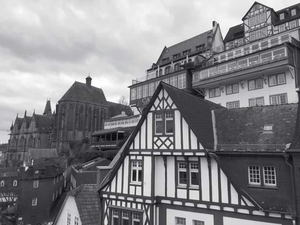 Blick auf das Institut in der Alten Universität Marburg eine säkulare Kommunität fürs Stadtviertel steingewordene Vision vom Zusammenleben, -feiern und beten einer christlichen Gemeinschaft
