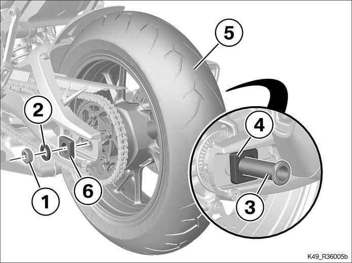 Bremsscheibe (2) drücken um Bremskolben zurück zu drücken. Kontermuttern (1) und Spannschrauben (2) links und rechts lockern. Mutter (1) mit Scheibe (2) ausbauen.
