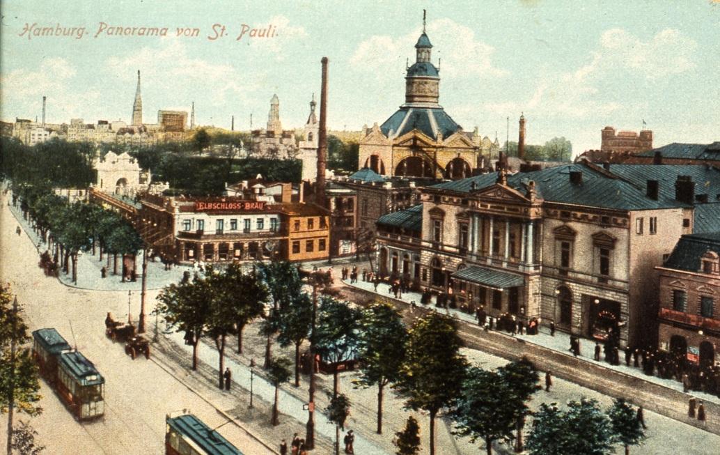 Postkarte: Konzerthaus Clausen um 1915 mit Blick auf die Reeperbahn Im Vordergrund: Zwei Wagen der seit 1894 in Betrieb gegangenen elektrischen Straßenbahn Links im
