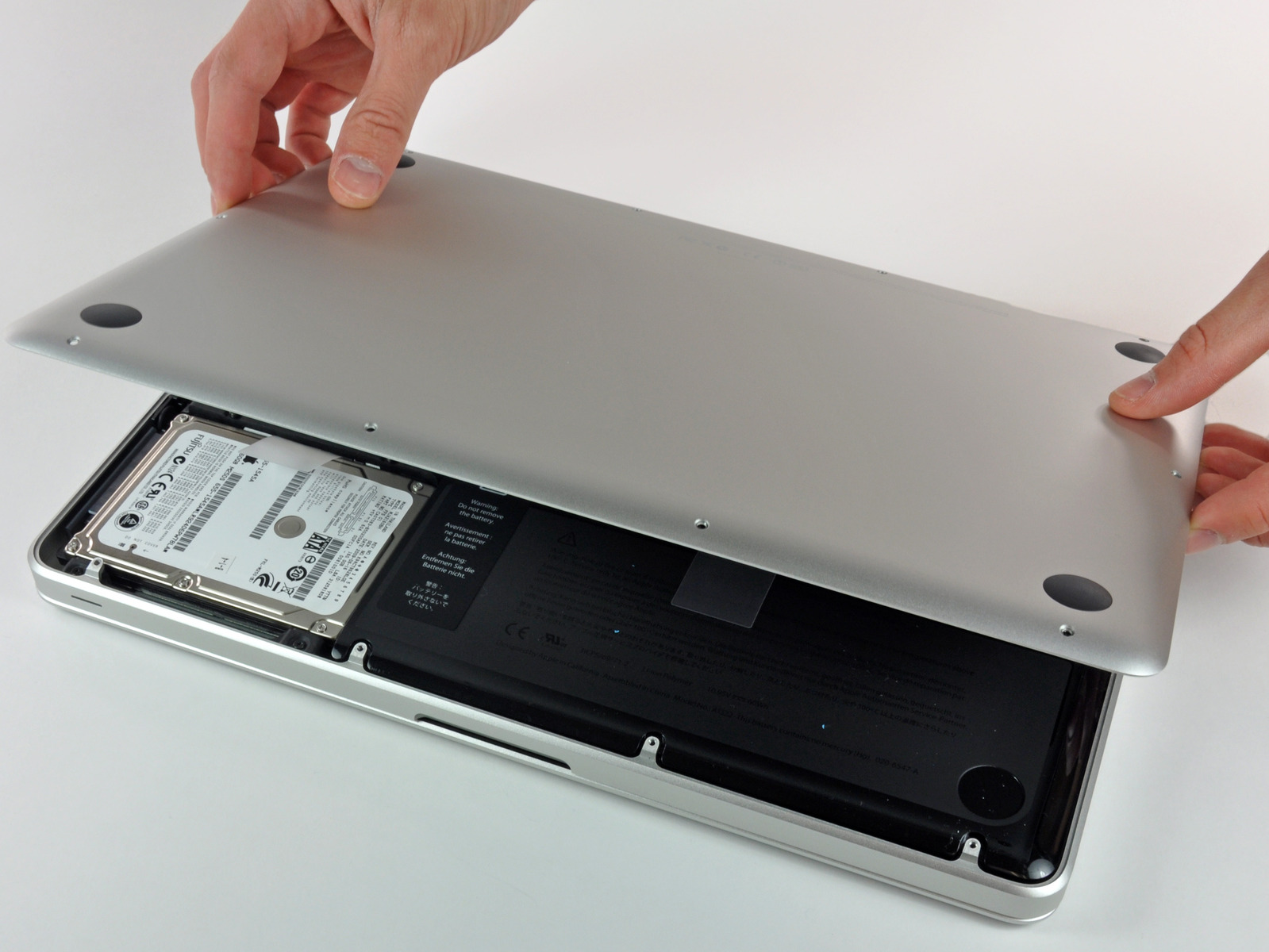 Schritt 1 Kleinbuchstaben Entfernen Sie die folgenden 10 Schrauben, die das untere Gehäuse mit dem MacBook Pro 13 "Unibody: Seven 3 mm Kreuzschlitzschrauben.