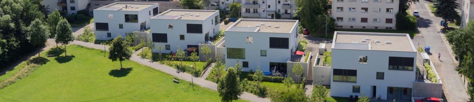 Das Quartier nimmt Form an Die Entwicklung des Quartiers begann 2009 mit der Herstellung der ersten Mehrfamilienhäuser in der Limburger Straße.