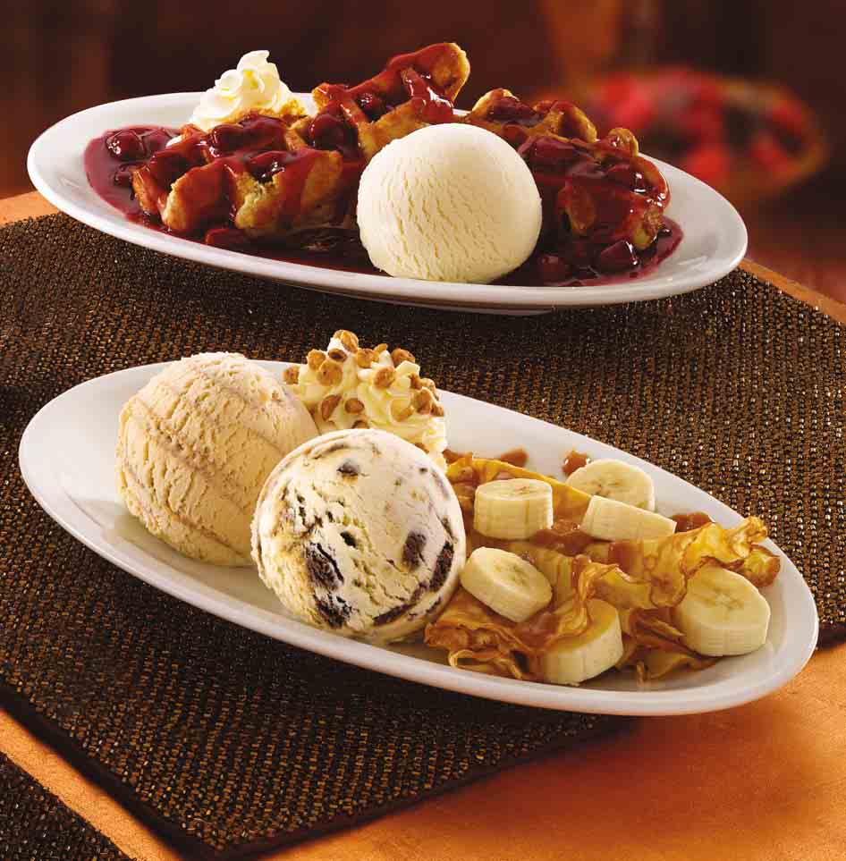 CHERRY WAFFLE Eine warme belgische Waffel mit einem Scoop Vanilla Eiscreme, heißen Kirschen und frischer Schlagsahne.