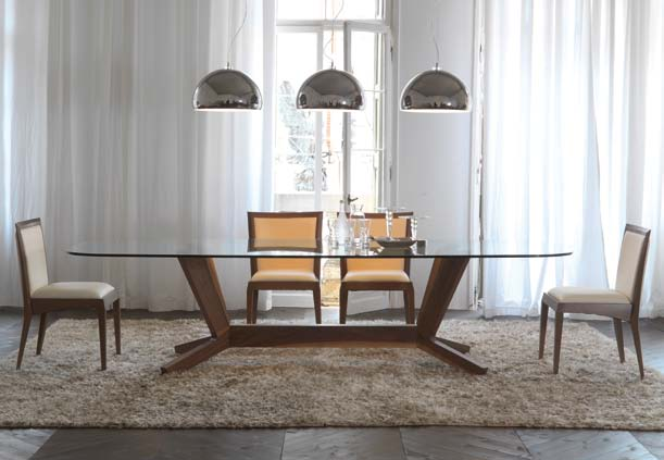 Table with base in solid canaletto walnut, wenghè stained solid ashwood or matt white or black lacquered wood with details in polished stainless steel. Clear glass top 15mm, laid on the base.