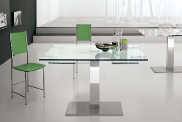 laminato postformato bianco lucido. Extendible table with stainless steel anti-marks base and stainless steel column.