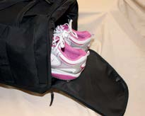 cloth and shoe compartments with zipper on both sides, handle with velcro tape