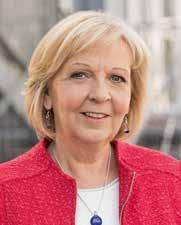 Die SPD in Nordrhein-Westfalen Das ist Hannelore Kraft. Sie ist seit dem Jahr 2010 Minister-Präsidentin in Nordrhein-Westfalen. Sie möchte Minister-Präsidentin bleiben.