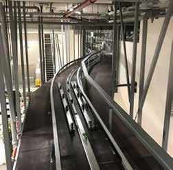 Fördertechnik Conveyor technique Konstruiert wurde eine Transportvorrichtung für Einkaufswagen in einem Gebäude mit komplexer Streckenführung: Sie beinhaltet sowohl gerade, kurvige als auch steigende