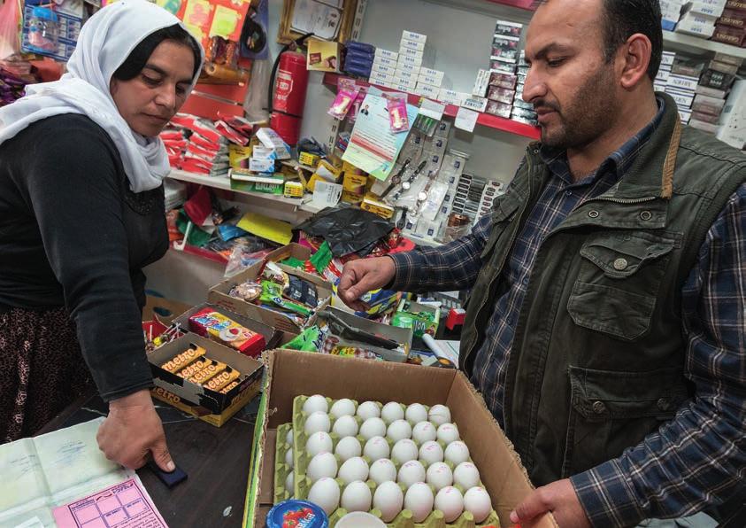 Katastrophenhilfe Ökumenische Diakonie 77 Bargeldtransfer, Gutscheine für Flüchtlinge im Irak Nahrungsmittelhilfe durch Gutscheine, sogenannte Food-Voucher.
