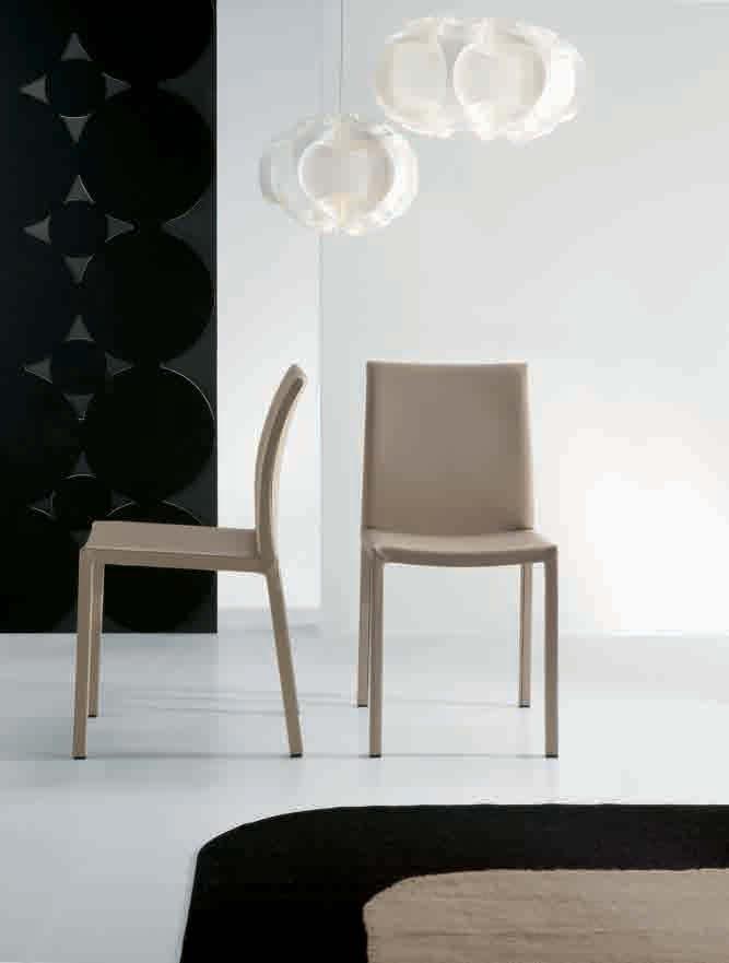 Mirta è una famiglia di sedute imbottite disponibili in diverse tipologie. Viene proposta anche nella variante con braccioli: Miss Mirta. Mirta is a family of chairs available in various models.