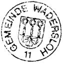 Beschreibung des Wappens: Über einem goldenen, mit einer halben roten Rose mit goldenen Butzen belegten Schildfuß in Rot drei goldene Abtkrümmen.