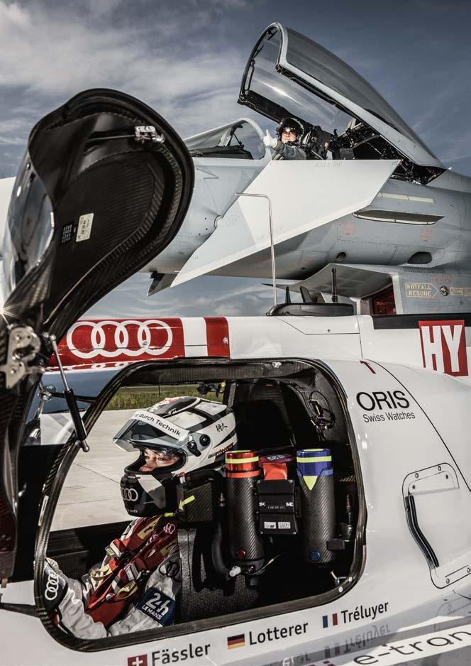Höhendifferenz: Pilot Krähenbühl thront etwa fünf Meter über der Erde, Rennfahrer Lotterer sitzt quasi direkt über dem Asphalt.