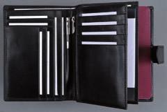 Travel organizer with compartment in the back, clear PVC compartment, three additional compartments, twelve business/credit card slots, pen loop, three SD-card compartments,