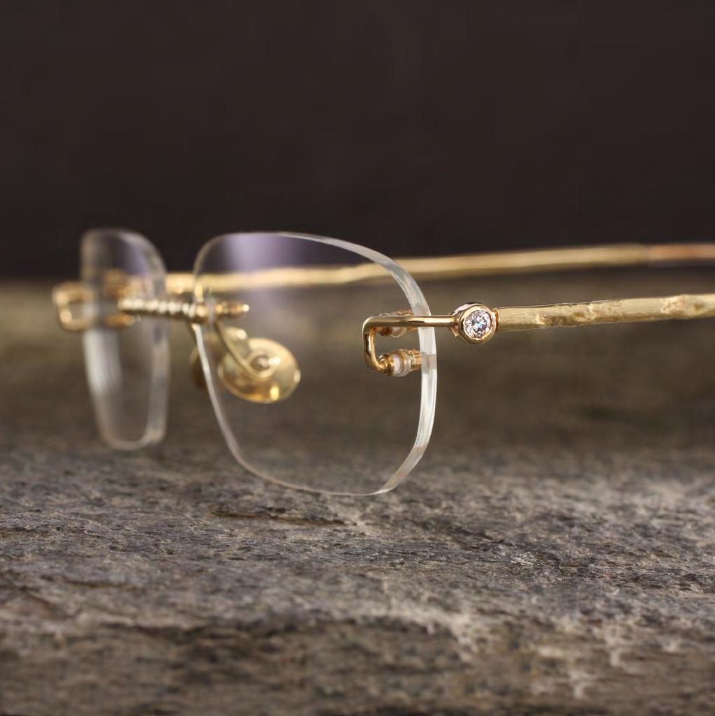 Randlose Brillen Randlose Brillen Rimless glasses Fire mattiertes und poliertes Gelbgold mit gesinterter Oberflächenstruktur 2 Brillanten zus.