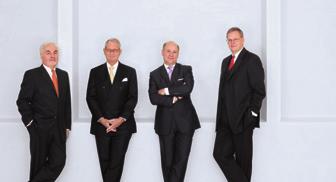 Der Vorstand: Karlheinz Nellessen, Dr. Henner Puppel, Dr. Thomas A. Lange, Uwe Lindner.