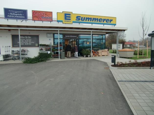 Motto: Nachwachsende Rohstoffe aus der Region beheizen unseren Markt und die Sonne versorgt ihn mit Strom EDEKA