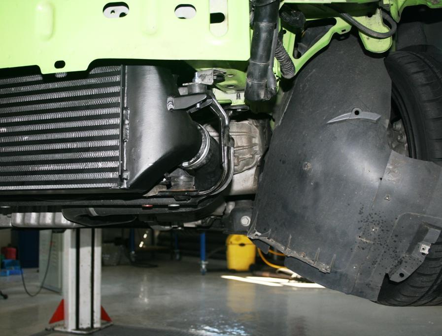 / Position the intercooler in place over the original mounting points left and right, images (1.