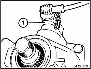 Stecker (1) vom Drehzahlgeber abziehen. Abdeckung an der Öffnung (1) seitlich am Kurbelgehäuse ausheben.