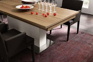 The foot column also has a practical purpose: It stores the extension leaves of the table when they are not required.