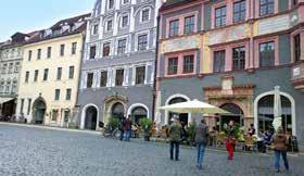 Rathaus auf dem Marktplatz dokumentiert wird. Der Ursprung der Stadt liegt auf der Dominsel, einer der vielen Oderinseln, die das geistige Zentrum der Stadt mit Dom und Bischofsitz geblieben ist.