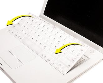 9. Drehen Sie die Tastatur um und legen Sie sie mit der Oberseite auf der Handballenauflage und dem Trackpad ab (Abbildung 4). Abbildung 4 10.