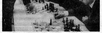 Co. Meister Wolk setzte nach 5½ Stunden 23 Spieler schachmatt und verlor nur gegen Patzer (SK 1893).