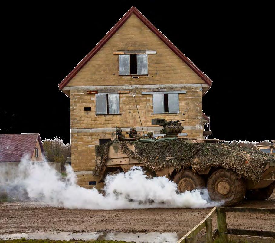 Diese bringt zuerst ihre schweren Waffen in Position: zwei Waffen träger Wiesel, einer mit Panzer abwehrwaffe TOW und einer mit Maschinenkanone 20 Millimeter. Beide sichern die linke Flanke.