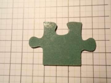 3.17. Puzzle Ein Puzzleteil liegt auf einem 1 cm x 1cm Raster. Das rechteckige Puzzle besteht aus 50 in etwa gleich großen Puzzleteilen.