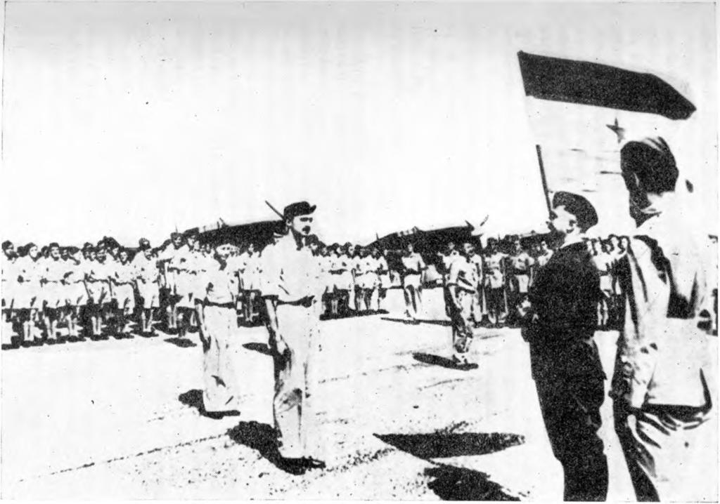 Izročitev zastave Prvi lovski eskadrilji v Afriki.