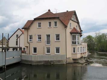 Mühlinsel 13 Erhaltenswertes Gebäude Wohnhaus und Scheune In Ecklage unmittelbar an der Einmündung des Mühlbachs in die Donau stehendes, zweigeschossiges Wohnhaus.