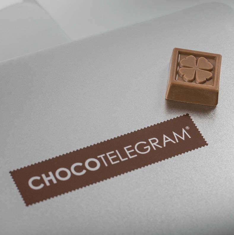 ChocoTelegram Silver Ihr Text aus Schokolade wird sich auch eindrucksvoll in einer eleganten silbernen Metalldose präsentieren.