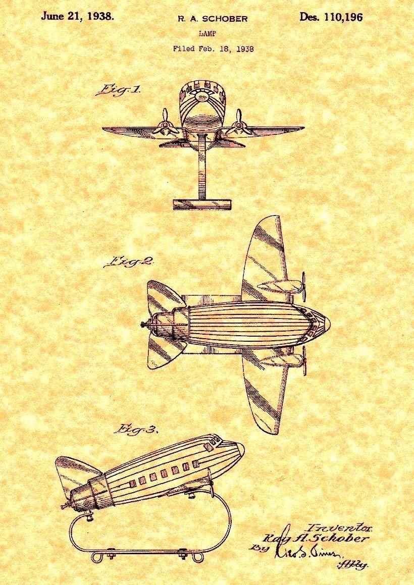 Flugzeug als Lampenschirm, form-geblasenes, mattiertes Glas, Metallteile verchromt Patentschrift R. A. Schober, June 21, 1938; Lamp; Filed Feb.