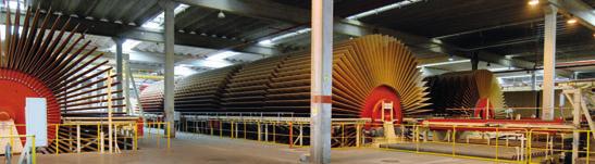 520 mm gepresst werden. Die Kapazität der Anlage beträgt 1.800 m³ pro Tag bei 15 mm Plattendicke (mech.).