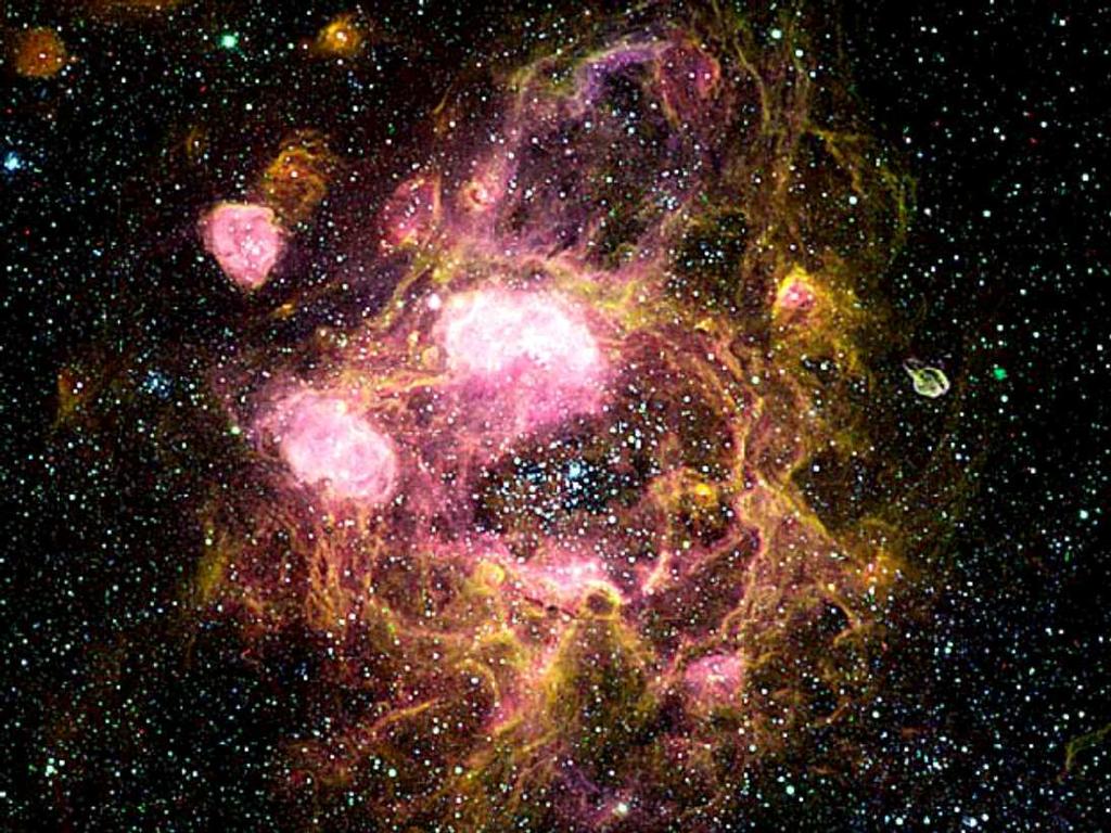 Sternbildungsregion in der Großen Magellanschen Wolke N11 in der GMW: Durchmesser 1000 Lichtjahre Der Sternwind von 50 heißen Sternen im Zentrum bläst das Gas nach