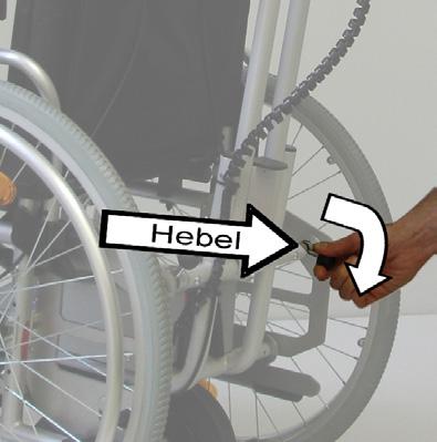 Betätigen Sie am Rollstuhl die Feststellbremsen. Schalten Sie die Antriebseinheit der Schiebehilfe aus und entriegeln Sie in den Schiebebetrieb. Lösen Sie den Verriegelungsmechanismus.