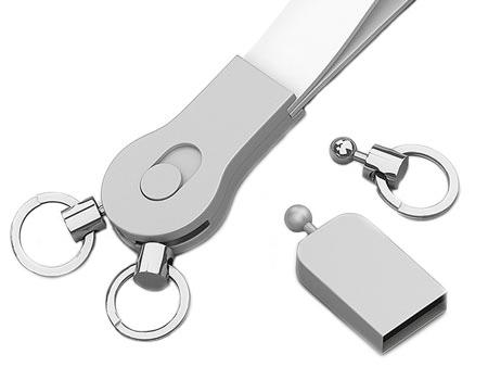 USB-Modell: SCHLÜSSELBUND Origineller Mehrzweckanhänger mit integriertem Mini-USB- Stick. Das farbige und robuste Silikonband ist in seiner Materialbeschaffenheit flexibel und sehr leicht.