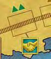 Der Spieler muss 400$ plus weitere 100$ für jedes Schwieriges Gelände -Symbol (Dreieck) neben den Gleisfeldern bezahlen. Die Farbe der Dreiecke dient lediglich der Identifizierung.