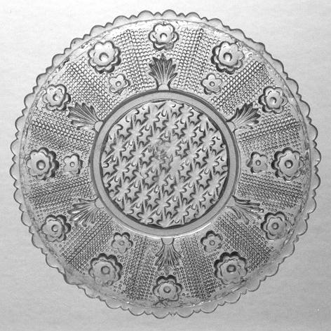 Im Preiskurant Hadeland 1867 ist der Teller DORIS Nr. 207 mit mehr als 48 Zacken gezeichnet und ohne erkennbare Mittelscheibe. Abb.