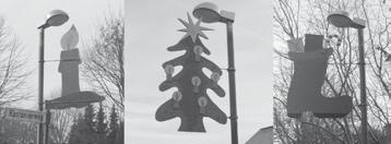 Gepflegt werden die Holzfiguren mit den unterschiedlichsten weihnachtlichen Motiven von Karl-Heinz Heising, der sie auch alle Jahre wieder an die Straßenlaternen montiert.