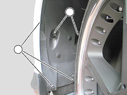 Remove bolts ( ) and plastic nuts ( ) at wheelarch cover ( Fig. 5 ).